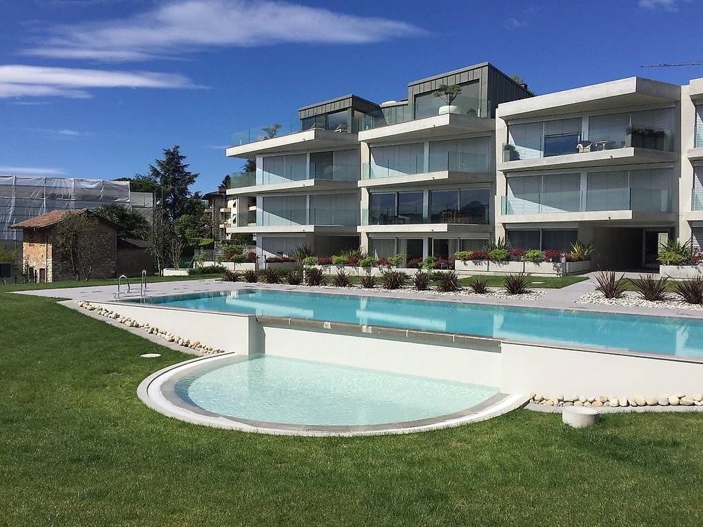 APPARTAMENTO 4.5 LOC. CON PISCINA MORBIO INFERIORE