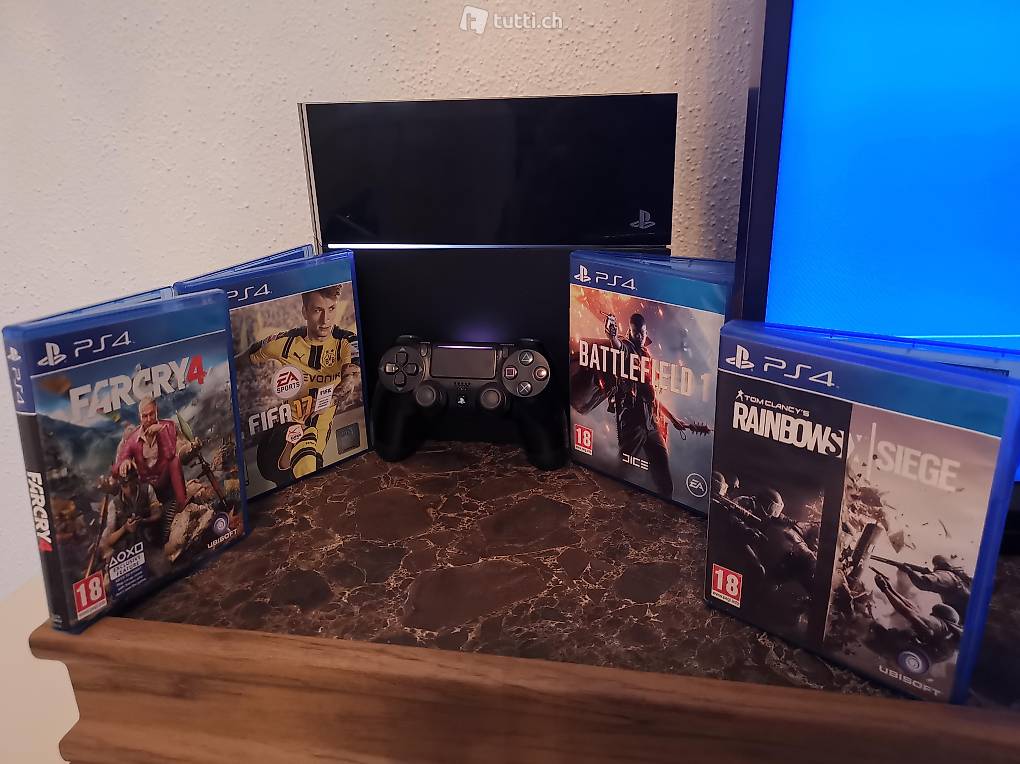 PS4 500 GB + Controller + 4 Games