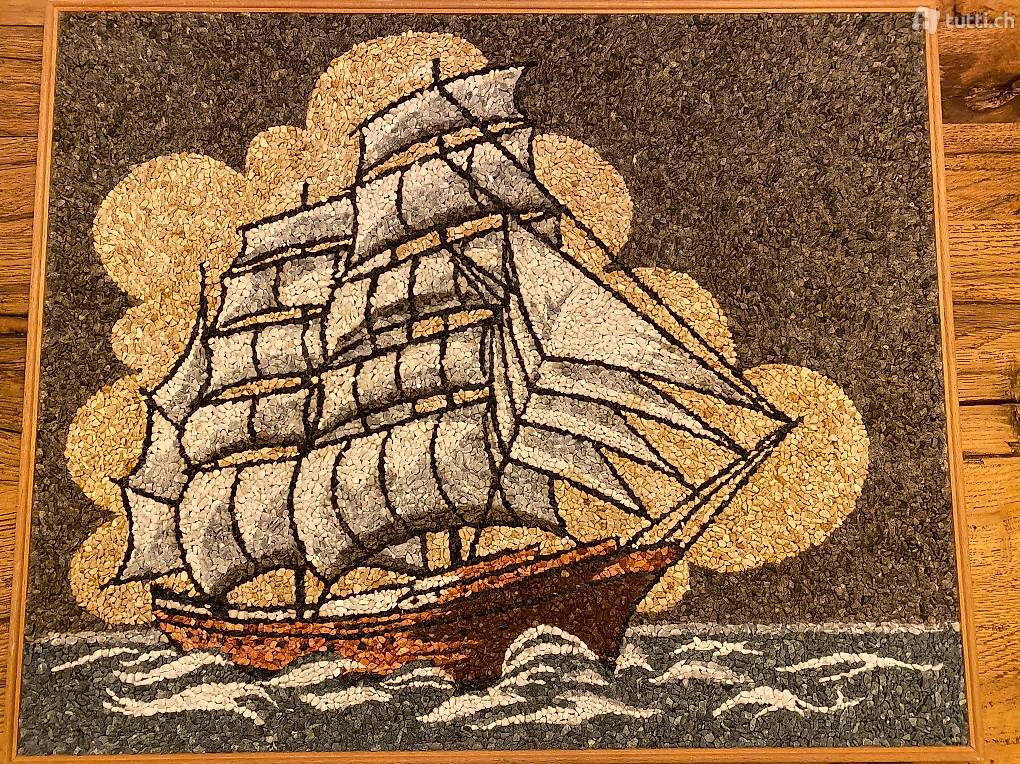 Schiff aus Kieselsteinen Bild