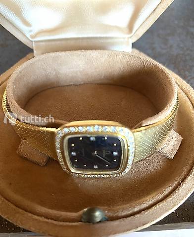 A vendre montre OMÉGA en or avec brillants