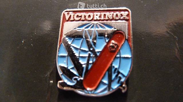 Victorinox Pin (Weltkugel mit Schweizer Sackmesser)